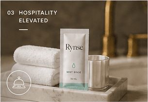 Rynse packet presented with a towel and glass in a hospitality setting